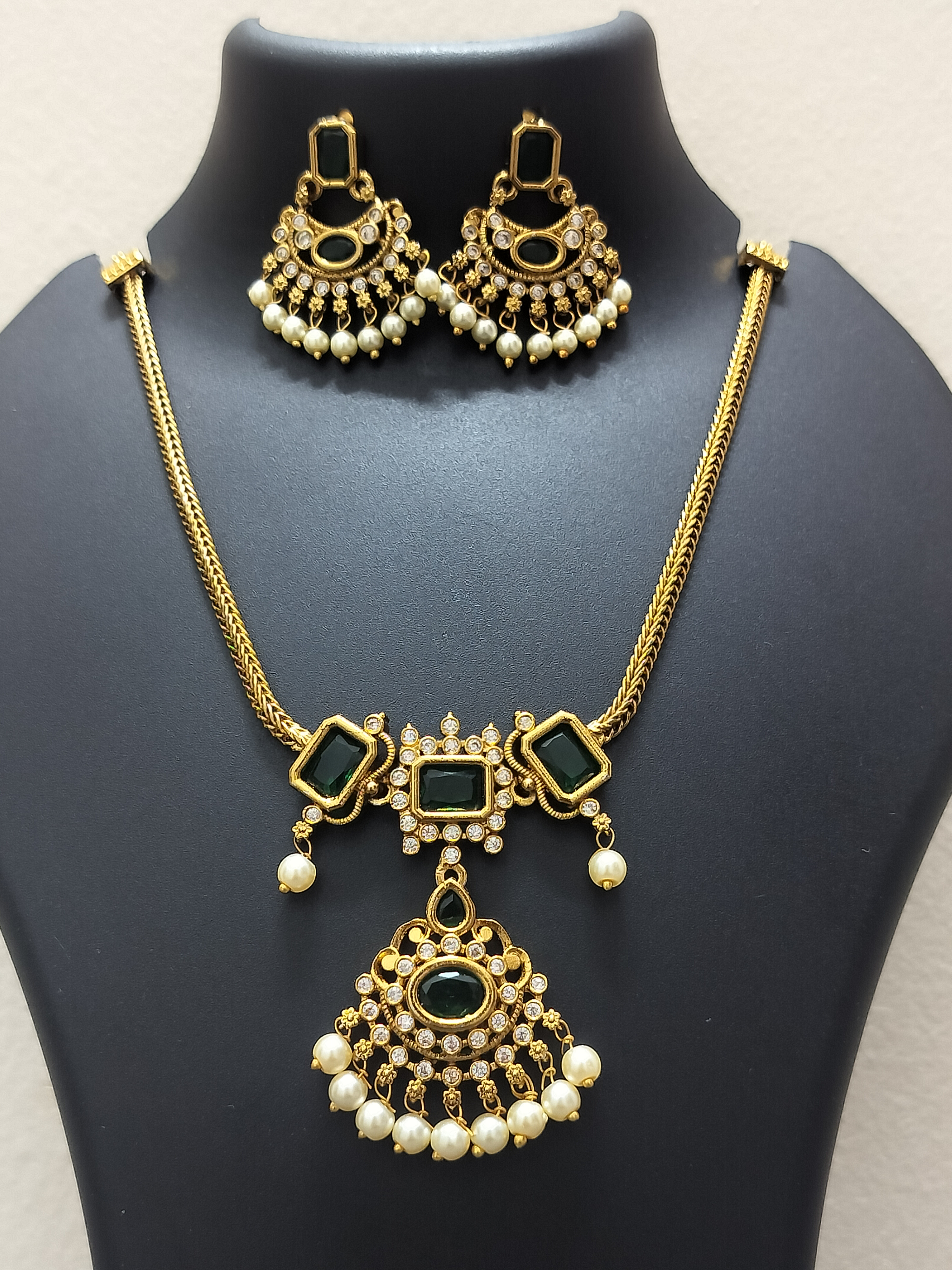 Heritage gold finish ruby pendants