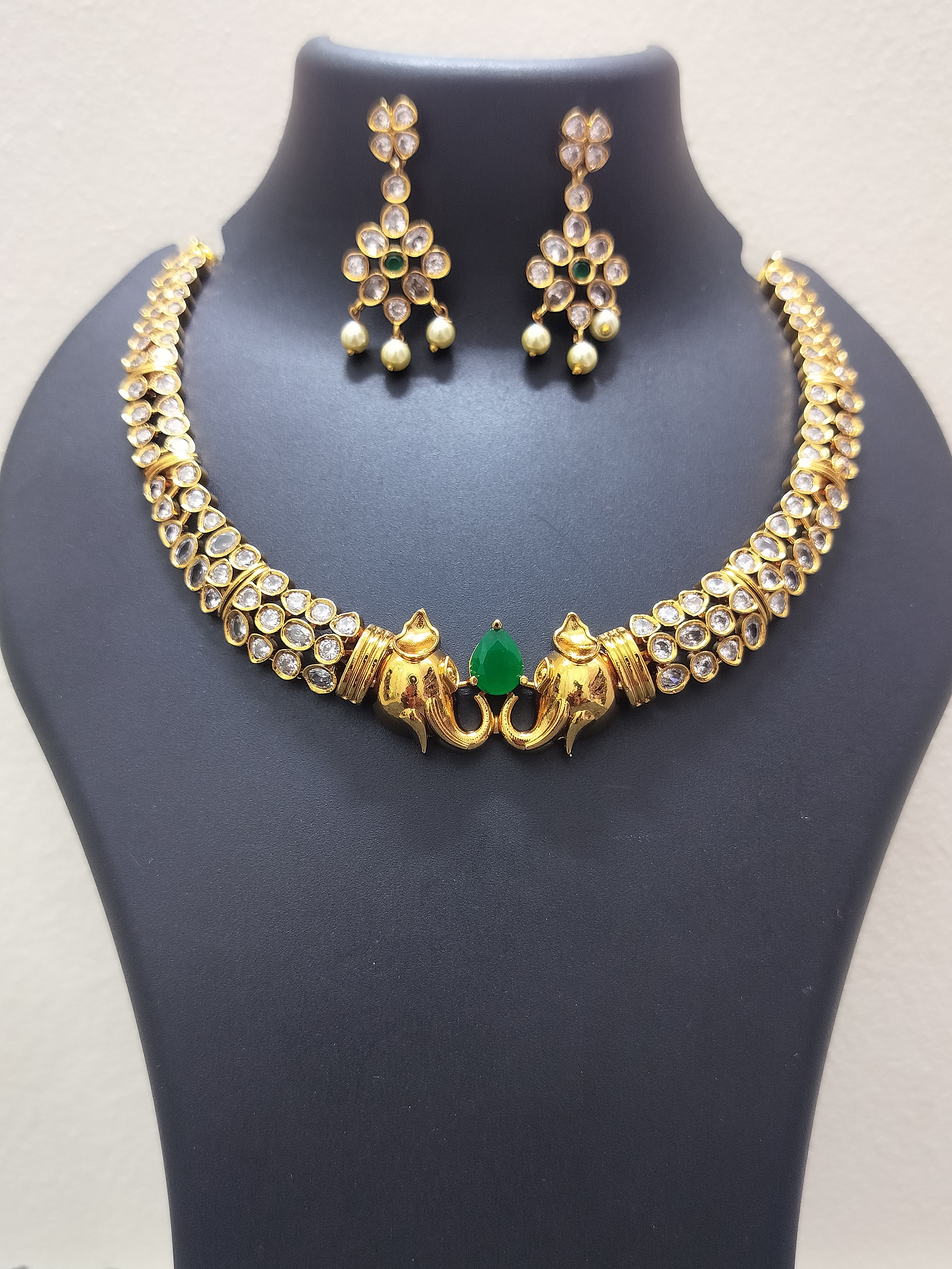 Traditional elemphant design green pendant