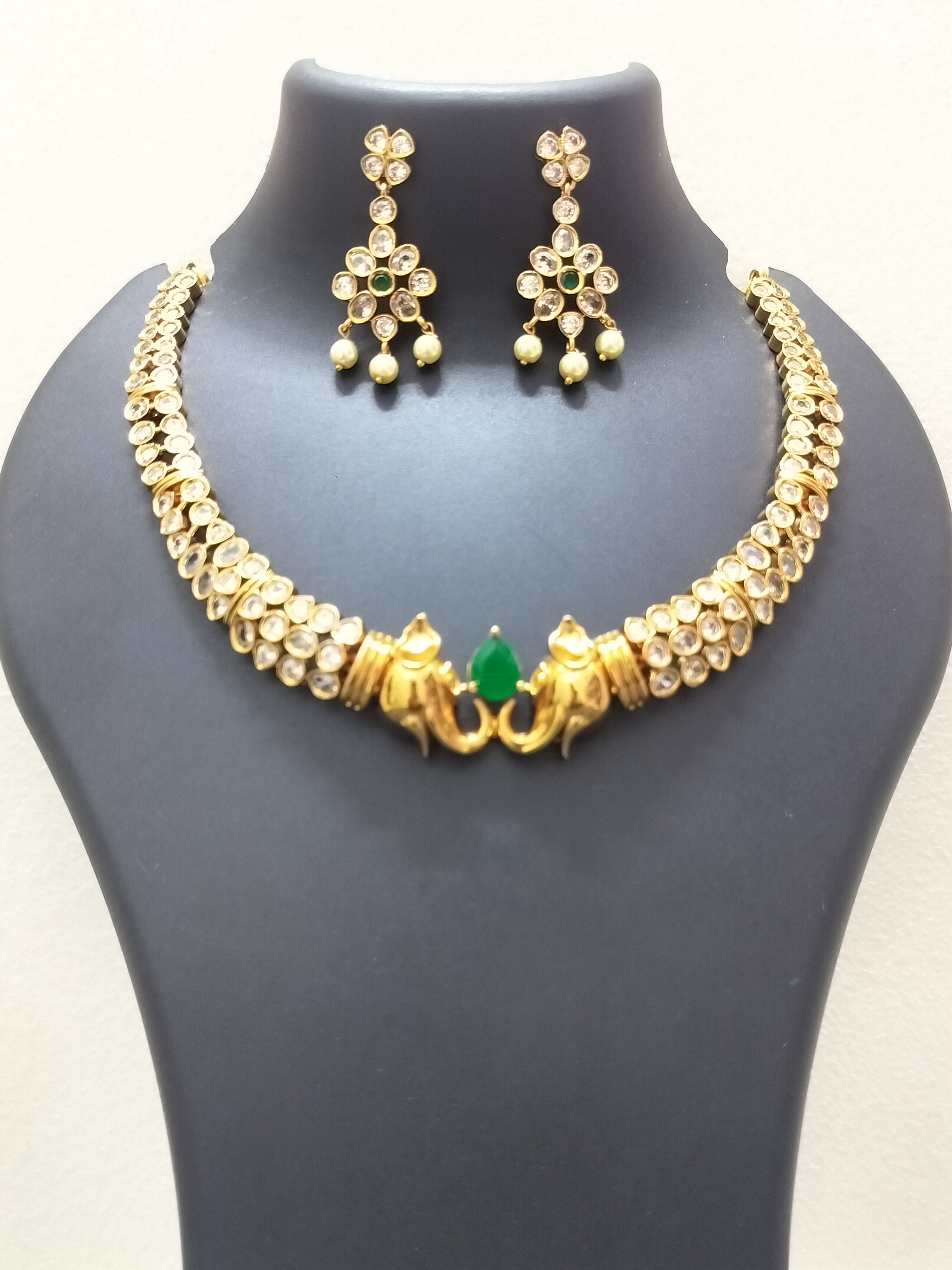 Traditional elemphant design green pendant
